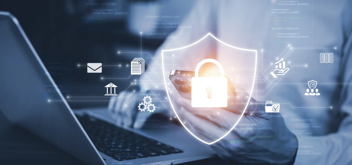 Person using smartphone with security icons